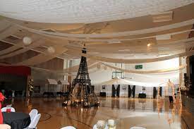 Transforming A Gym Into A Prom Drape Table Runners On A Fish Line Up And Down For Walls Prom Decor Paris Theme Party Dance Decorations