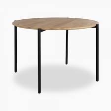 One of our mortise & tenon classic dining tables first introduced in 1995 shown as: Donovan Round Dining Table Natural Mango Wood 110cm Cult Furniture