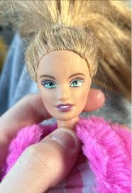 Hi, Can anyone offer any advice about these two dolls please. Doll  measurements: 22cm high They are all porcelain. And are held together  (arms, legs, head by some kind if string inside