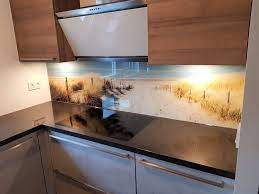 visualls keukenachterwand glas met strand en duinen ontwerp wordt op maat gemaakt en aangepast aan de keuken keuken achterwand keuken ontwerp keuken behang