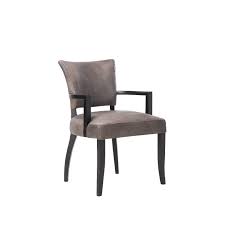 Their hardwood design works well with both traditional spaces and modern designs, with a or choose a set of vintage oak dining chairs with intricate detailing. Timothy Oulton Mimi Dining Chair With Arms Black Oak Legs Stocktons Designer Furniture