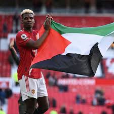 Manchester united's paul pogba and ivorian midfielder amad diallo brandish a palestinian flag after the team's final home game of the season . Israel Striker Takes Aim At Paul Pogba And Amad Following Their Support For Palestine Mirror Online