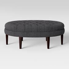 Hide your storage in an ottoman so sleek, the guests would never know. Large Oval Cocktail Ottoman With Tufting Threshold Target