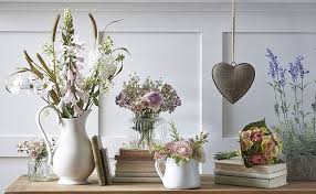If you decorate with a large group of plants, so it would be best to hide the pots with specially. How To Decorate Your Living Room With Artificial Plants