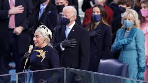 The superstar singers support president joe biden & vice president kamala harris with stellar performances at the washington, d.c., ceremony. Lady Gaga S Inauguration Brooch Evoked The Hunger Games To Twitter S Delight