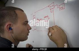 San Diego State's Kyle Spain, left, is forced to dish off a pass as his  path to the basket is blocked by New Mexico's Jamaal Smith during the first  half of a