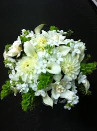 Bridal Bouquet With Stephanotis Bells Of Ireland Gardenias Dalias Stock Etc Pauline S Bloomers Wedding Flowers Irish Wedding Wedding Flower Packages