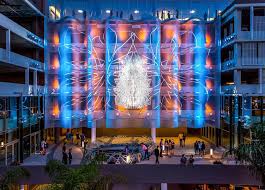 Los Angeles Opens Its Heart Of Compassion De Cliff Garten Es Una Obra Para Reconocer Que Mas Alla De Ser Una Ciudad De Ent Public Art Facade Facade Lighting