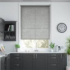 We love how the wood keeps this modern kitchen warm and welcoming, despite its like laminate, vinyl is an affordable alternative to hardwood that presents a similar look. Laurent Silver Grey Roller Blind