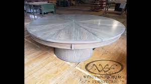 Extendable round dining room table modern solid wood medium brown. Expanding Round Table