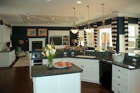 I Have The Navy Walls And White Cabinets Trying To Decide On Counters Anyone Have An O Large Kitchen Design Traditional White Kitchen Cabinets Kitchen Design