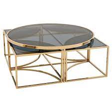 Shop our glass nesting coffee tables selection from the world's finest dealers on 1stdibs. Eichholtz Bergen Hollywood Gold Blue Glass Nesting Round Coffee Table Gold Nesting Coffee Table Gold Coffee Table Coffee Table Design