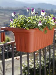 They simply bolt to your existing window box brackets for an easy installation over a 2 x 4 or 2 x 6 wood railing. Amazon Com Apollo Exports International Ap 30218tc 24 Adjustable Railing Planter Terra Cotta Garden Outdoor