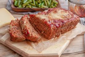 2 lb meatloaf mix (beef, pork, and veal), 1 cup cooked oatmeal, 1 cup finely chopped onion, 1/3 cup finely chopped fresh parsley, 1/4 cup soy sauce, 2 large eggs, 2 teaspoons finely chopped garlic, 1/2 teaspoon dried thyme, 1/2 teaspoon black pepper, 1/2 cup chili sauce. Italian Meatloaf With Parmesan Cheese