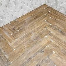 Floor Is In Herringbone Pattern In A 6 X 36 Wood Plank Tile Looking Good So Far Remodeling Tile Her Wood Plank Tile Wood Look Tile Floor Tile Floor Diy