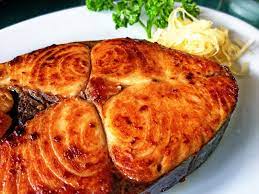 pan fried tanigue narrow barred spanish mackerel if you are lucky to find the authentic or what they call the class a type then its fish meat literally me