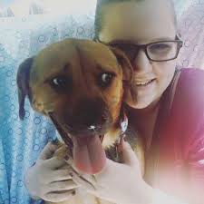 Dog giving sad face after eating chicken