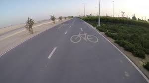 The clip shows a white suv zipping past cyclist on qatar's olympic cycling lane stretching between the doha golf club and al khor. Cycling At Qatar Olympic Cycling Track Part 1 Youtube