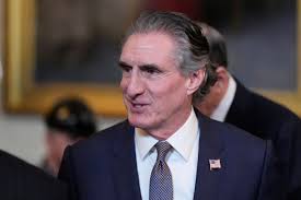 Naval officer accused of touching himself while college student was sleeping