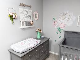 The simple approach really showcases the nursery's defining feature: Gray And Pink Floral Baby Girl Nursery With The Evolur Santa Fe