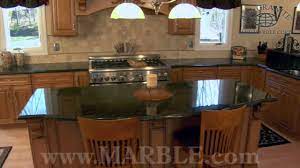 With small flecks of white, gold and light green, this granite is one of the most common stone surfaces used in kitchens because it suits most decor styles. Ubatuba Granite Kitchen Countertops I Marble Com Youtube