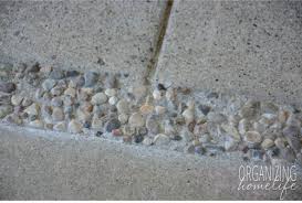 Updating An Outdated Patio With Pea Gravel Organizing Homelife Diy Concrete Patio Pea Gravel Patio Repair