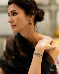 We always love ourselves a little pop of color! 💙 . . Featured: Julia gold  and emerald ring; Thea gold silver diamond emerald blue sapphire and blue  enamel bracelet; and Emir gold