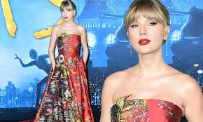 We look back at taylor swift's greatest style hits. Taylor Swift Is Gorgeous In A Red Floral Gown At The World Premiere Of Her New Music Cats Daily Mail Online