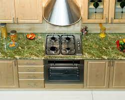White cabinetry matched with green granite countertops balance and neutralize the overall look of a kitchen whether it may be traditional or contemporary. Paint Color Advice For A Kitchen With Green Countertops Thriftyfun
