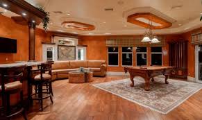 Paint a faux wood plank wall with five shades of brown and some antiquing glaze. Faux Painting Decorative Painting Services Certapro Painters