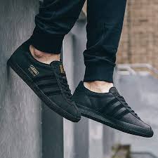 Black And Gold Sneakers Mens Scotts On Instagram The Best Selling Black Leather Gazelle From Adidasoriginals Is Back 67 0270 Sneakers Fashion Sneakers Men Fashion Adidas Gazelle Mens