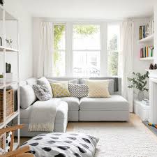 The space is raised from the main floor via a few steps and is host to modern furniture in black and beige. Small Living Room Ideas How To Decorate Compact Sitting Room And Snugs