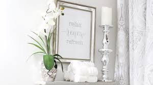 A wall gallery of favorite objects like starfish or baskets can be a replacing your bathroom fixtures can even make your countertop look fresh again. Bathroom Decorating Ideas Above Toilet And Countertop Youtube