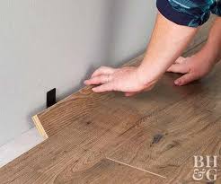 How To Install Laminate Wood Flooring For An Affordable Home Makeover Wood Laminate Flooring Installing Laminate Wood Flooring Flooring
