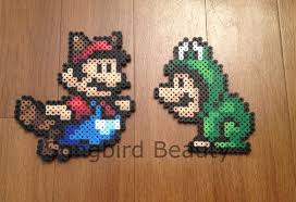 Elements Mesurent Environ Mario 4 75 X 5 Luigi 4 X 4 75 Perler Bead Art Perler Bead Mario Diy Perler Beads