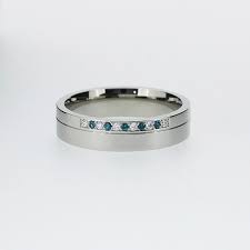 Men S White Gold Wedding Band With Teal And White Diamonds By Torkkelijewellery Mens Wedding Bands White Gold White Gold Wedding Bands Diamond Wedding Bands
