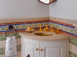 Beautiful mosaic accents give the space a touch of luxury. Corner Bathroom Sinks Hgtv