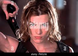 RESIDENT EVIL: Apocalisse Milla Jovovich oggetto: donne moto data: 2004  Foto stock