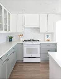 Popular white kitchen cabinets gleam with pizzazz, do you agree? 24 Trendy Kitchen Colors With White Cabinets Grey Appliances White Modern Kitchen White Kitchen Appliances Kitchen Cabinets Grey And White