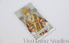 He sits atop a chair or throne, before two identical pillars. Major Arcana The Hierophant Tarot Card Meaning The Pope Viva Luna