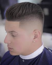 The mid fade haircut and the wavy fohawk go extremely well together. 15 Best Faux Hawk Fade Haircuts For Men In 2021
