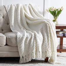 Then a statement throw like this, there's lots more colours here. Amazon Com Bedsure Cream White Throw Blanket For Couch Knit Woven Chenille Blanket Versatile For Chair 50 X 60 Inch Super Soft Warm Decorative Ivory Blanket With Tassels For Bed Sofa And