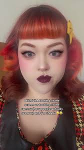 Girl with Red Hair Stops and Looks at Camera