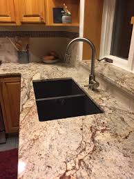 Sienna Bordeaux Granite Almond Subway Tile With Icy Red Mini Mosaic Samsung Granite Countertops Kitchen Kitchen Remodel Countertops Granite Kitchen Counters