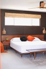 Button tufting dots the headboard for added retro appeal. 48 Simple And Elegant Mid Century Modern Beds Digsdigs