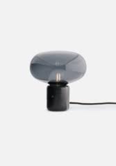 This soothing lamp combines the soft curves of glass with the stability of black marquina or smoked oak. New Works Karl Johan Table Lamp Black Marble Signe Hytte Iconic Contemporary Design Average Toronto Canada