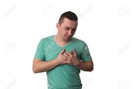 Young Man Holding A Hand To His Heart Due To This Pain Over Stock Photo Picture And Royalty Free Image Image 37864678