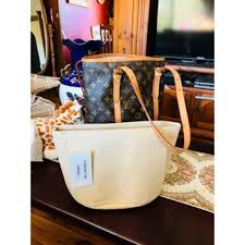 This bag is the newest addition to the lockme line. Lv Bucket Gm Bag Organizer Bag Organizer
