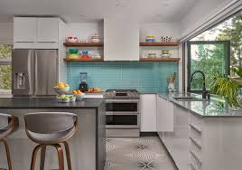 Features white cabinets, aqua walls and a white subway tile backsplash for a refreshing look. 75 Beautiful Kitchen With Glass Tile Backsplash Pictures Ideas March 2021 Houzz