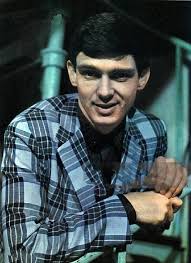 What are the origins and variations of the phrase 'Here I sit  brokenhearted, tried to shit but only farted'?